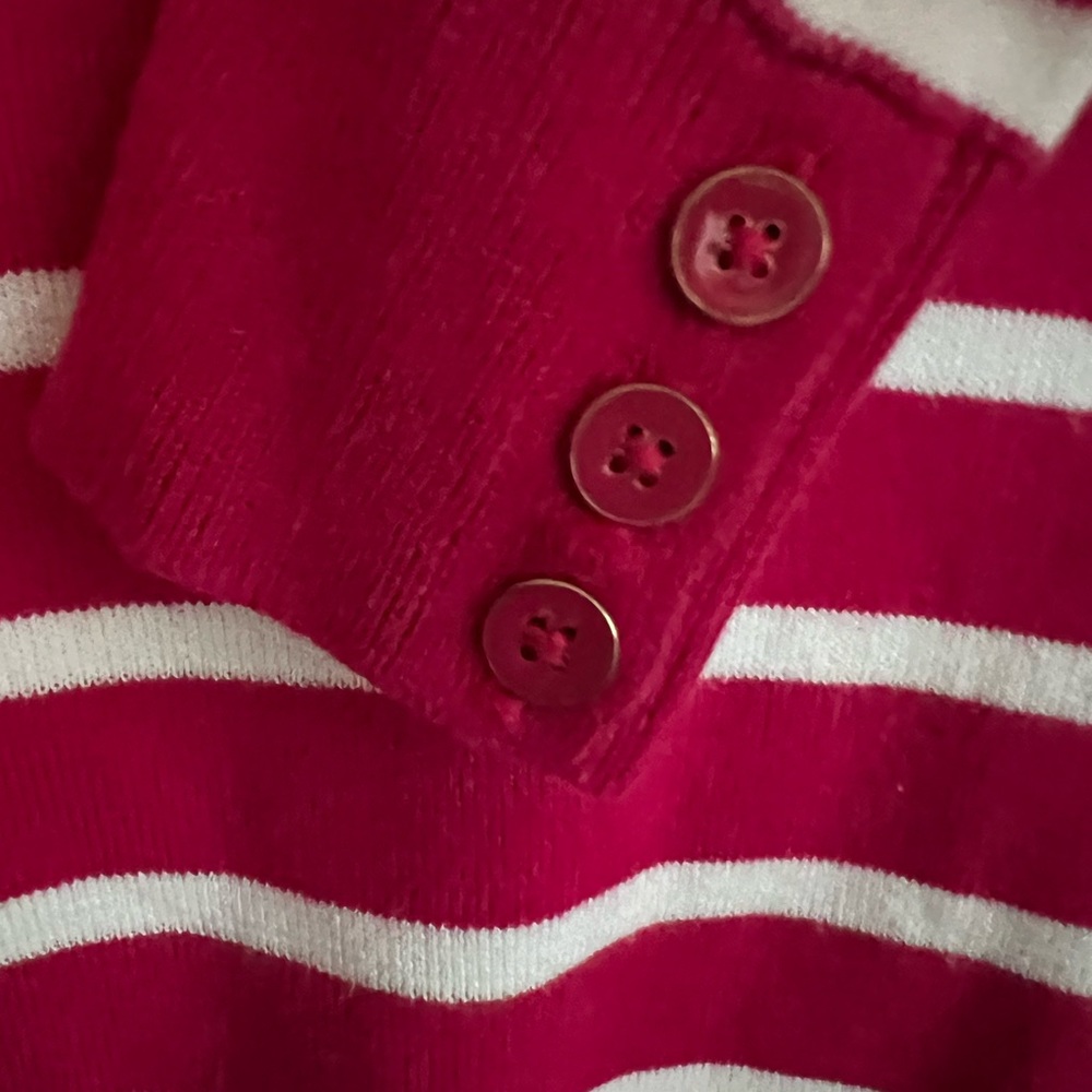 Pink and white striped fall sweater.